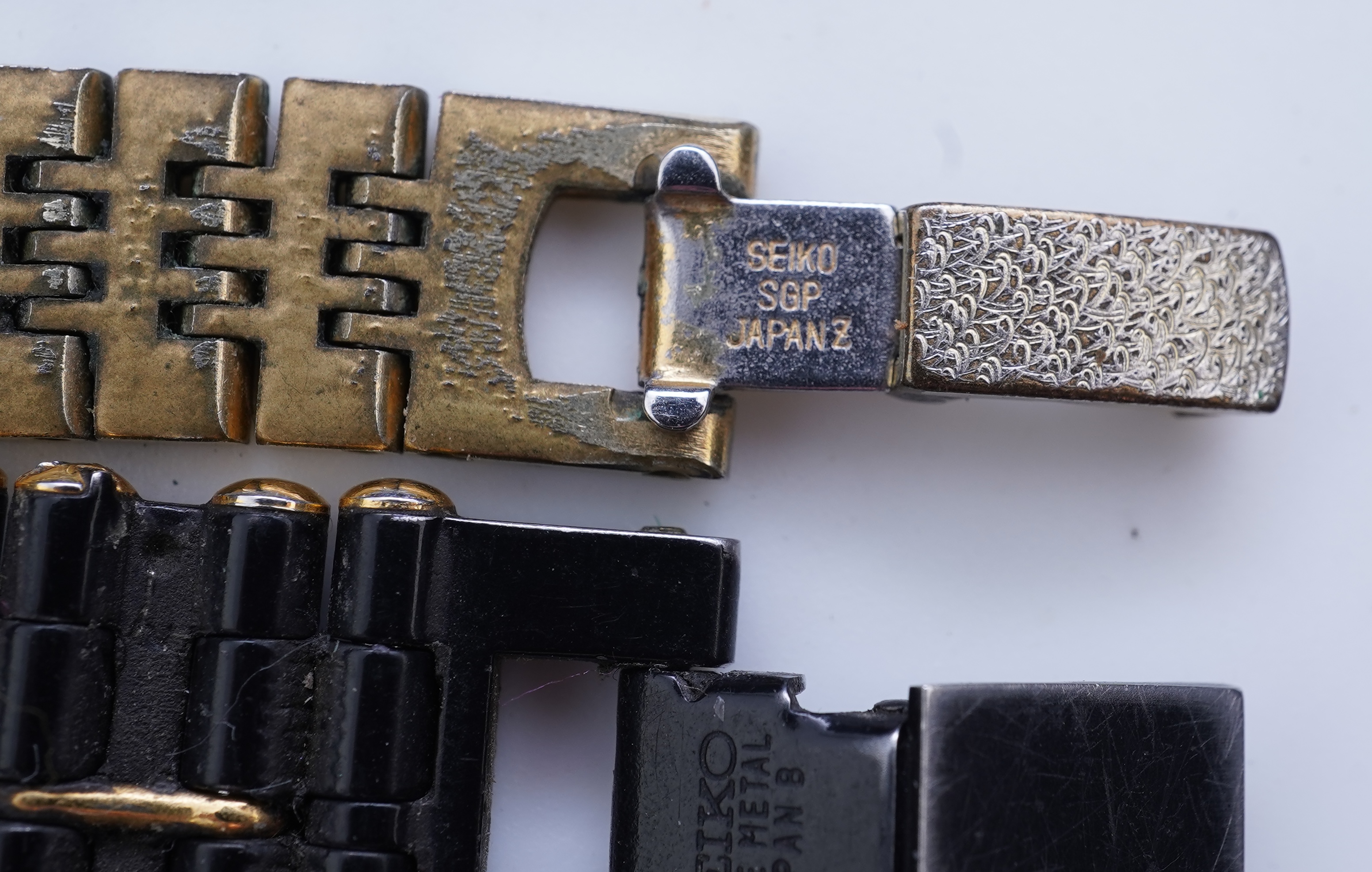 XX REMOVE ROLEX XX, A collection of watches and a bangle, comprising: two Seiko quartz watches; a manual winding watch by Larex; a quartz watch by Eterna; a quartz watch by Rotary; and a quartz watch by Pulsar; together